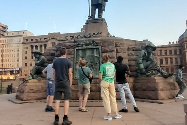 Hominids Tours German Family at the City center by the Statue of Paul Kruger, Paul kruger Square 